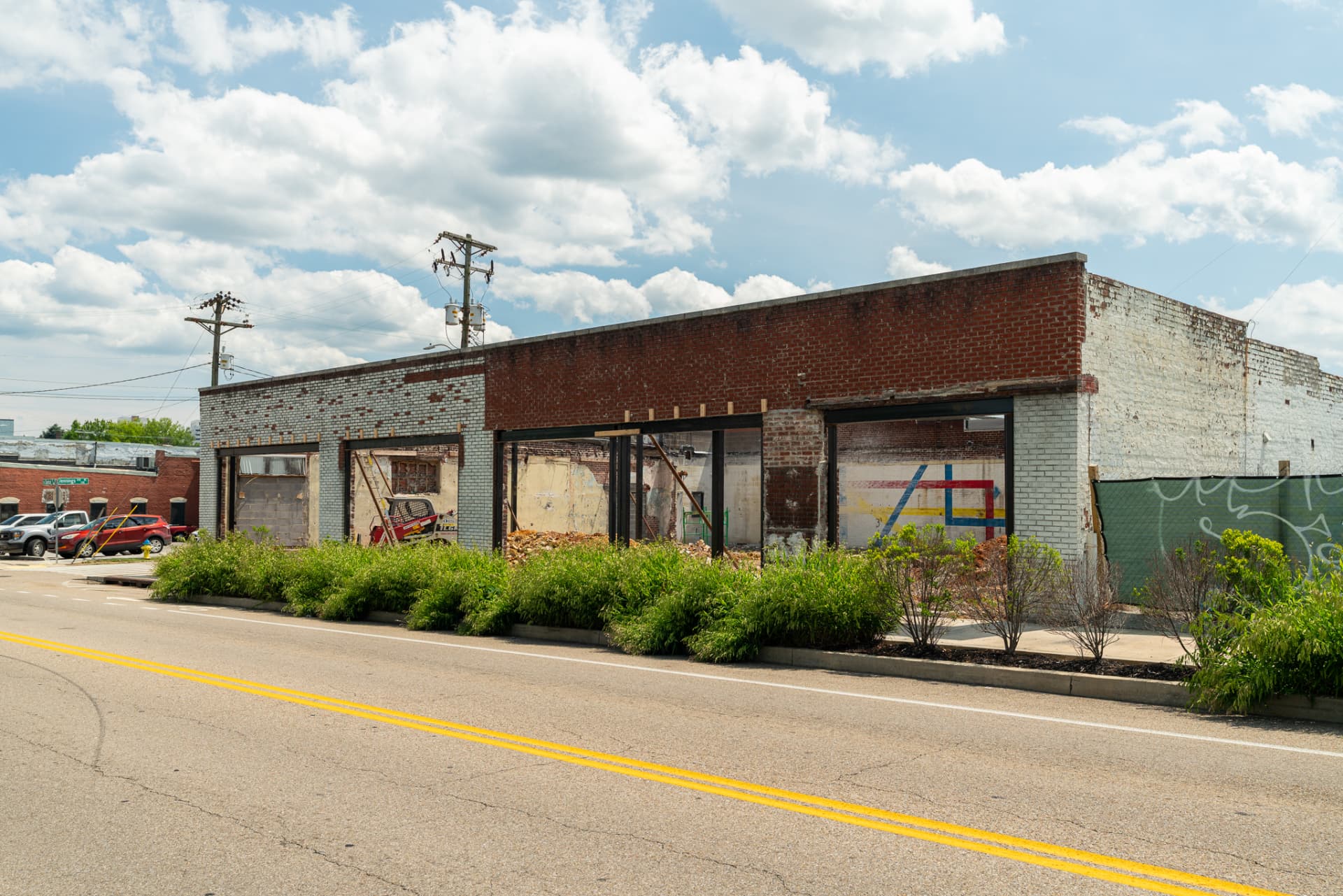 Street-level construction documentation of a historic brick storefront renovation