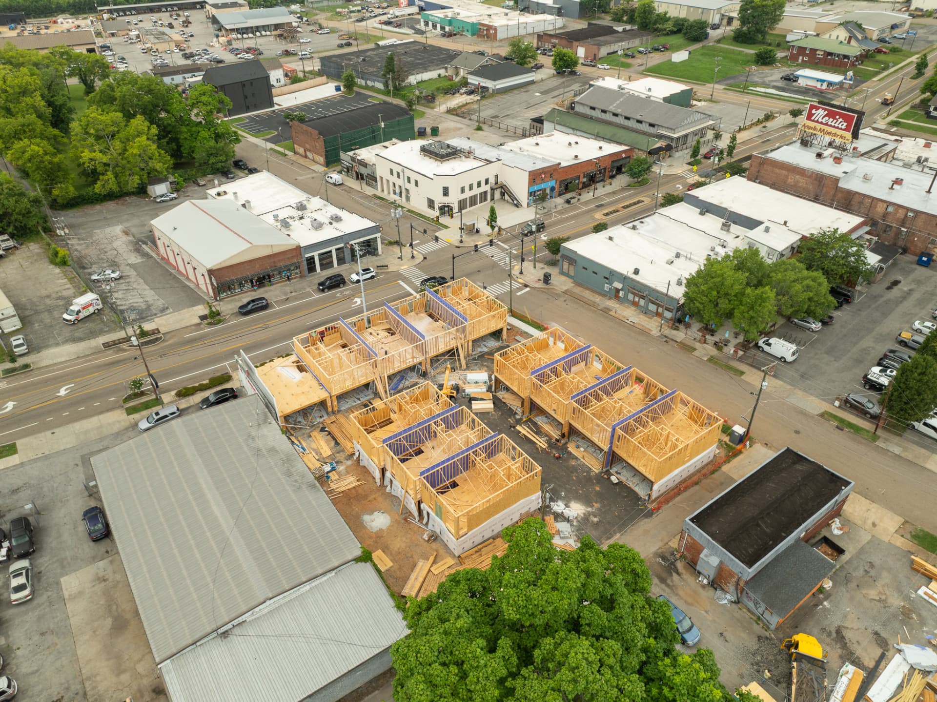 Aerial progress photography of a multifamily wood-frame construction project