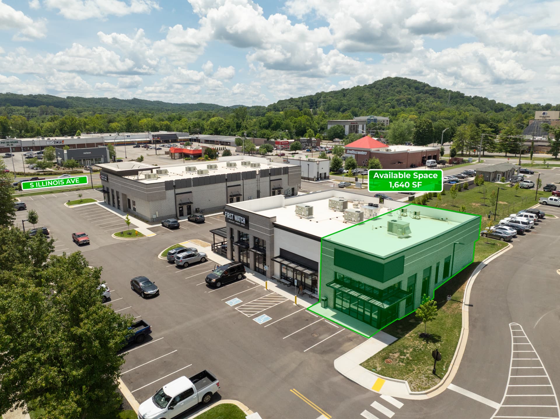 Aerial leasing photograph highlighting available commercial retail space