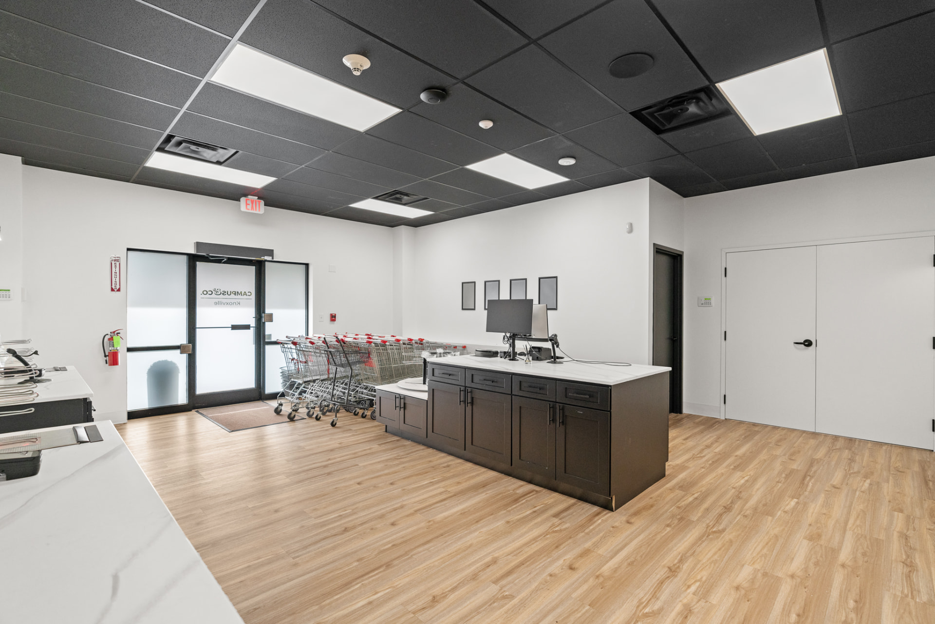 Flash-ambient commercial interior photography of a finished retail checkout area