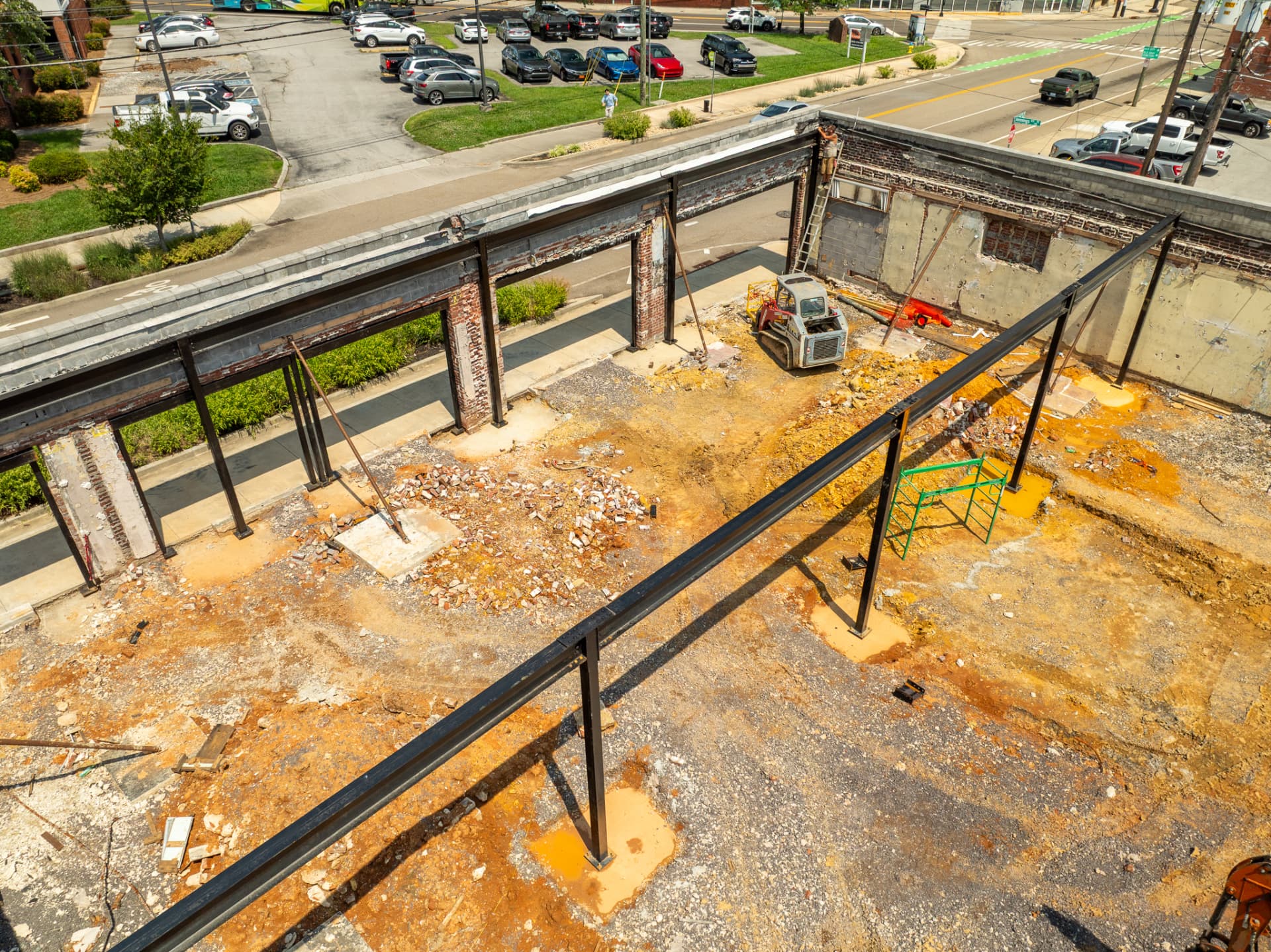 Drone view of structural steel installation at a brick commercial renovation